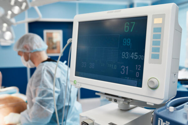 anesthesiologist-keeping-track-vital-functions-body-during-cardiac-surgery-surgeon-looking-medical-monitor-during-surgery-doctor-checking-monitor-patient-health-status anesthesiologist-keeping-track-vital-functions-body-during-cardiac-surgery-surgeon-looking-medical-monitor-during-surgery-doctor-checking-monitor-patient-health-status